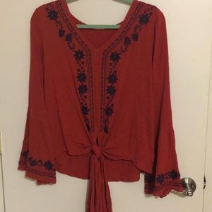 Shirt barely worn. Large but is more of a medium